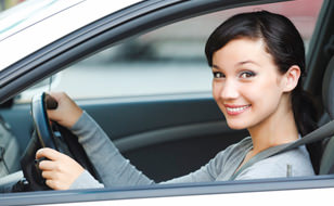 Happy Woman in Car