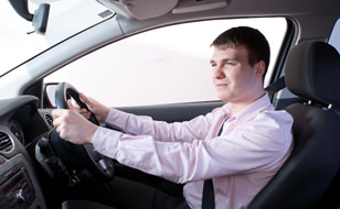 Man Driving His Car