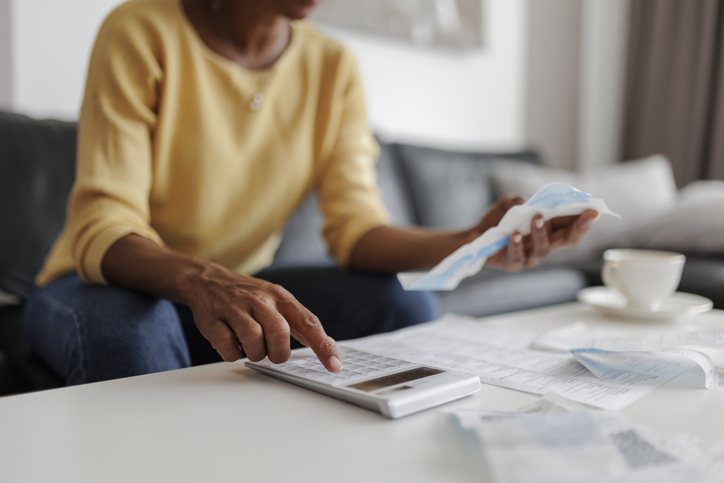 Woman calculating home costs