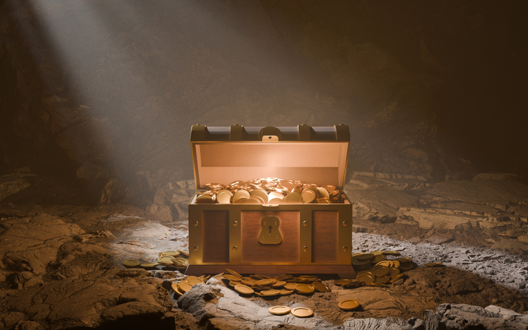 Treasure in a cave with a golden glow