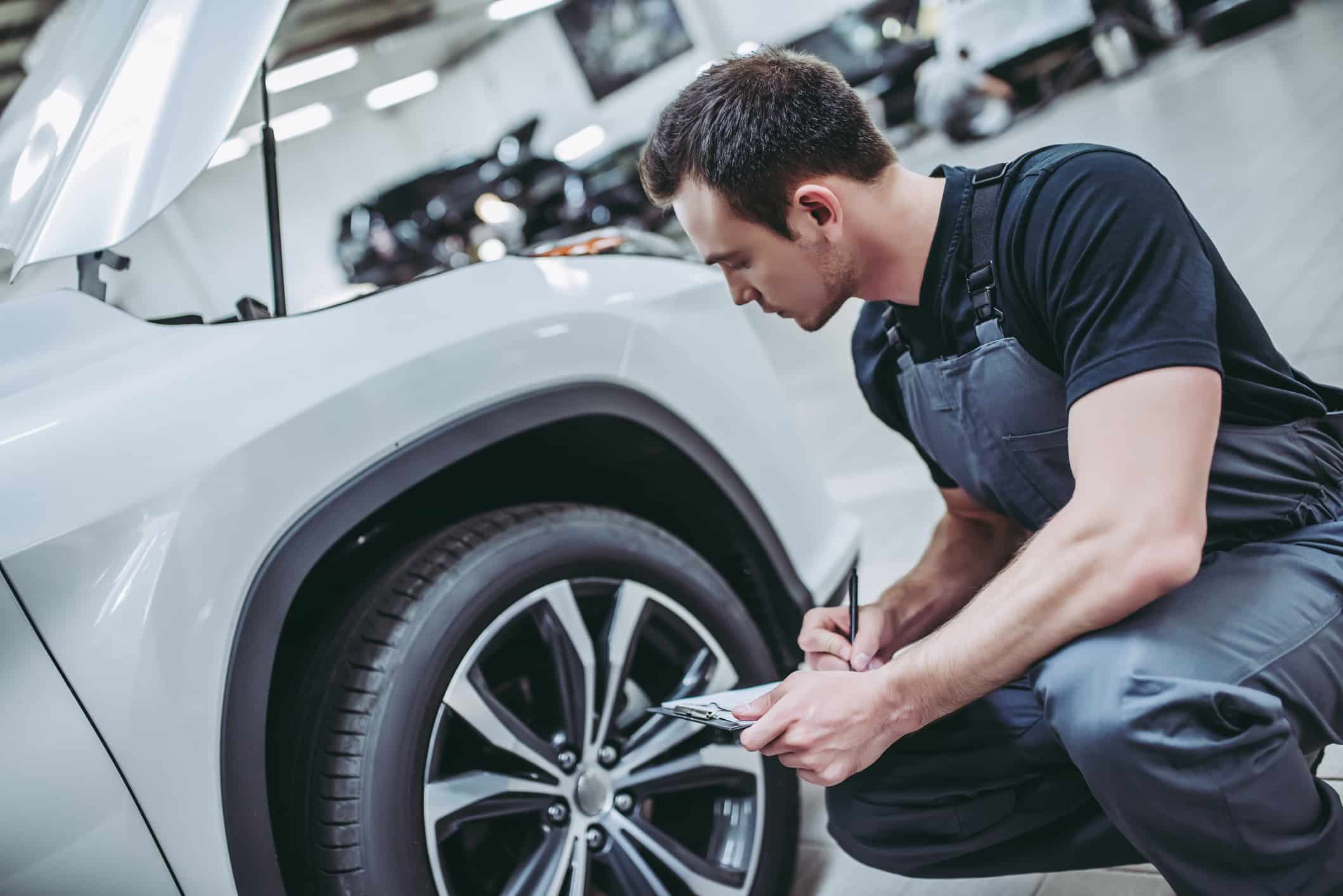 inspecting-car-wheel