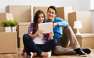 Couple Preparing To Move Home To A New House With Home Insurance From Chill Insurance