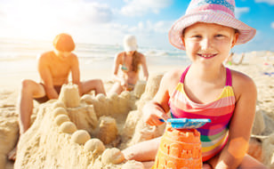 Child Building a Sand Castle