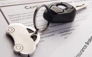 car-keys-on-insurance-documents