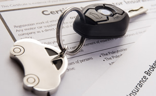 Car Keys on Insurance Documents
