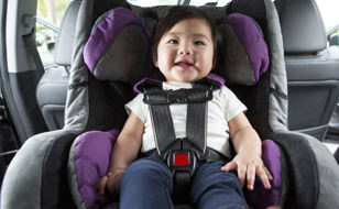 Smiling Child In Car Seat