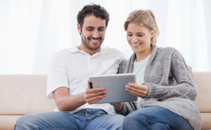Couple Using a Tablet Device