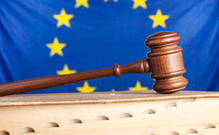 Gavel in Front of a European Flag