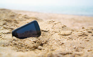 Mobile Phone in the Sand