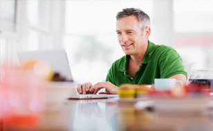 Man Choosing An On-Line Broker