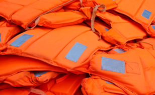 Life Vests in a Pile