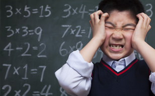 Frustrated Child Doing Maths