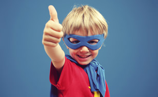 Superhero Child Giving Thumbs Up