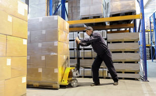 warehouse-worker-moving-pallets