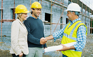 Architect Explaining Liability Cover To Owners Of A Property