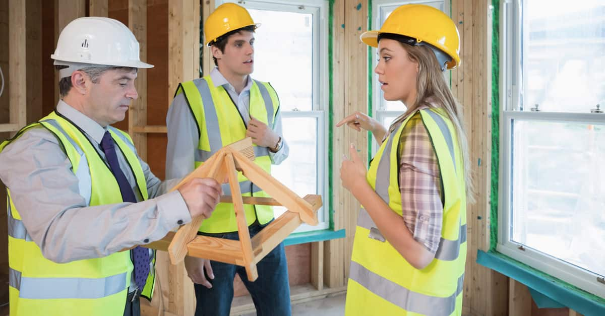 Couple Getting Advice On Their New Home Build